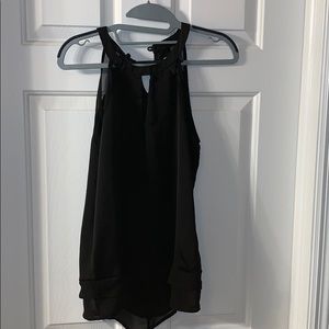 Black sleeveless blouse